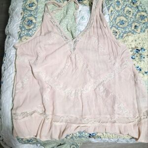 Light pink sleeveless summer top